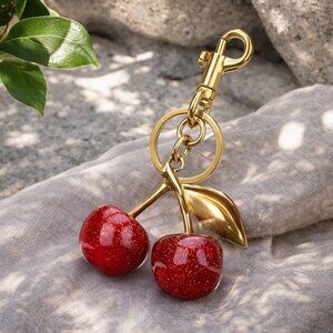 "Glitzy Cherry Delight" - Fashion Glitter Resin Cherry Bag Gold Charm Keychain